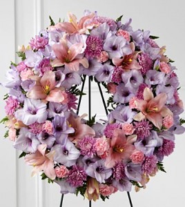 Shades of lavender standing spray Funeral 
