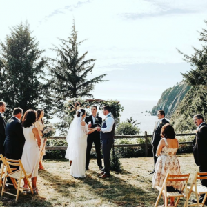 Shades of Pink and White Cresent to Greenery Arbor Florals