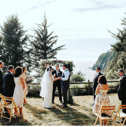 Shades of Pink and White Cresent to Greenery Arbor Florals