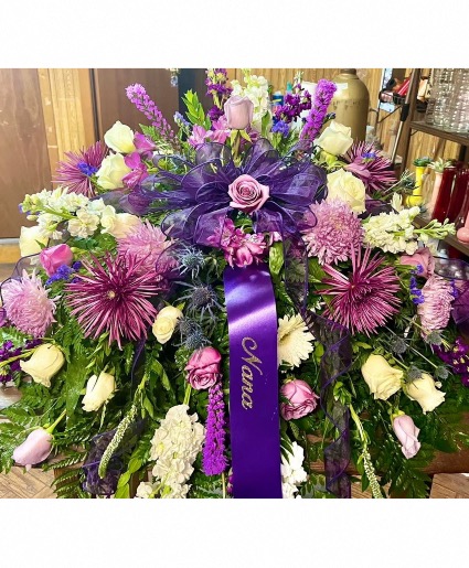 Shades of purple  Casket spray 