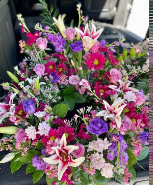 Shades of Purple with Stargazers Urn Arrangement