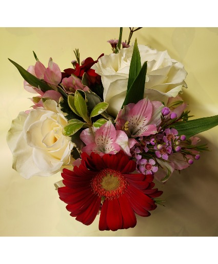 Small Handheld Bouquets for prom or     (CO) homecoming Starting at 48.00 and up...need to order early for this product.may be out of these flowers