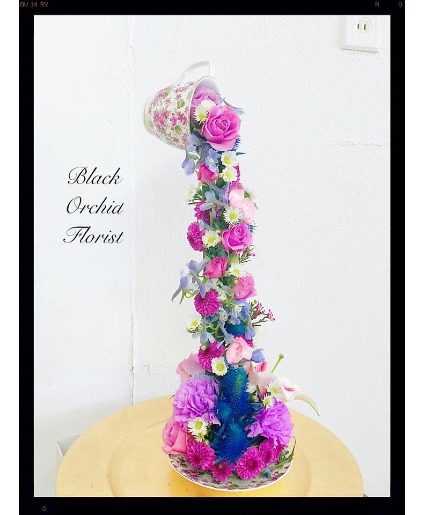 Small Tea Cup sympathy arrangements