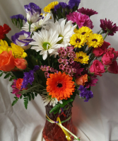 Smiles and Sunshine Bouquet...Bright    (E) assorted Flowers in a colored  OR CLEAR VASE!