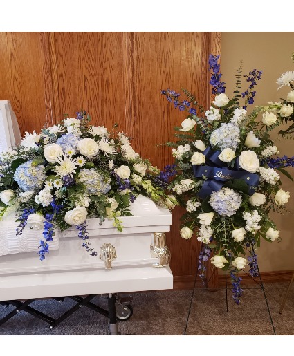 Soft blue goodbye Casket spray with matching standing spray