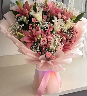 Soft Passion Bouquet Bouquet made of pink lilys, white lilys, spray mini roses, and baby breath