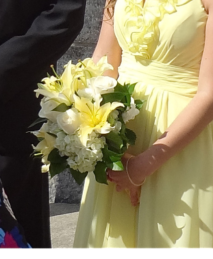soft yellow and white  hand held bouquet