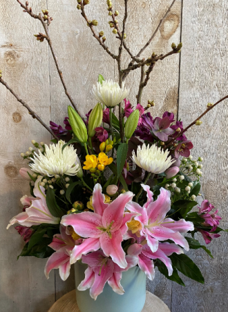 Spectacular Blooming Beauty Floral Arrangement in ceramic pot 