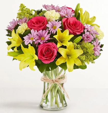 Spring Arrangement Mix Arrangement with lilys, roses, solidago, daysies, and carnations