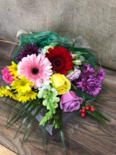 Spring bouquet of mixed flowers Wrapped in cello, no vase