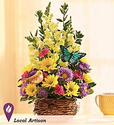 Springtime Basket of Blooms With Bird and Butterfly