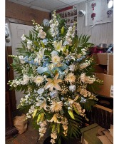 standing spray sympathy spray blue and white