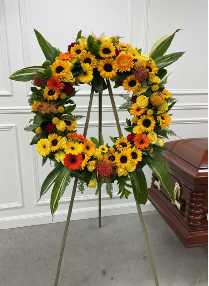 STANDING WREATH SPRAY MIXTURE OF SUNFLOWERS AND OTHER FLORALS