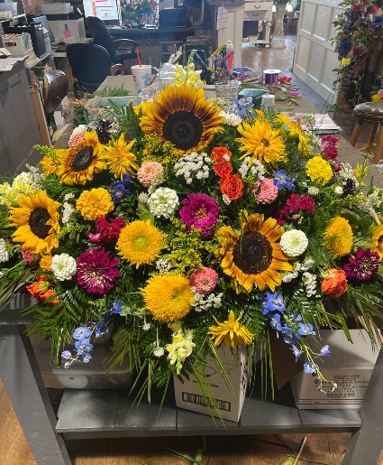 Sunflower and wildflower mix casket spray Casket Spray