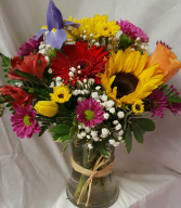 Have A Sunny Day Bouquet! Seasonal    (E) flowers arranged in a clear vase!
