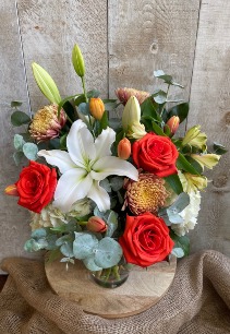 Sunny Day Blooms arrangement in a vase
