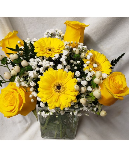 SUNNY DELIGHT...YELLOW ROSES AND YELLOW (E) Gerbera daisies or sunflowers if gerberas out of stock with seasonal filler