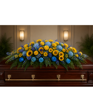 Blue Skies and Sunshine Casket Spray 
