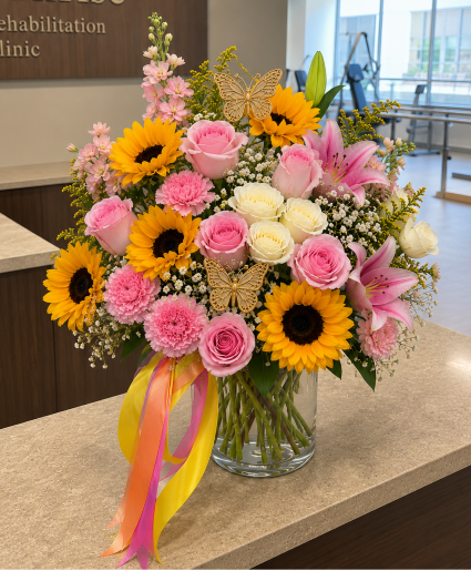Sunny Wishes Vase Call Us for Faster Service & Daily Specials: (915) 303-8500 Text Us to Order Anytime: (915) 505-3708 Your trusted source for Flowers & Delivery in El Paso TX 