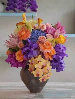 Sunset in Bloom  Luxury Peach, Purple and Yellow Floral Arrangement