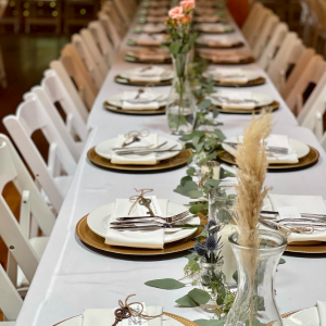 Table runner with stems in vases  wedding table decor 