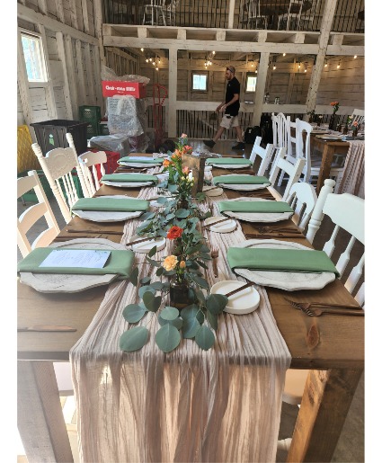 Table Scape garland and bottles Wedding