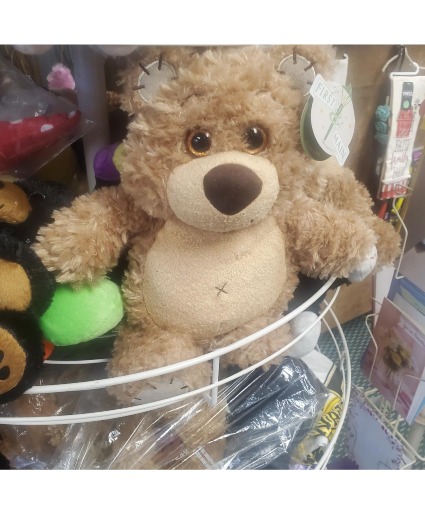 Tan bear plush animal