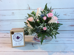 Roses in Tea Cup W/ Tea 