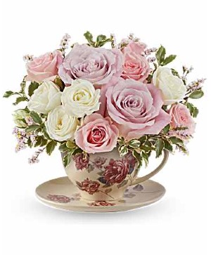 Teleflora's Blooming Petal Bouquet Fresh arrangement in a collectable Teleflora keepsake