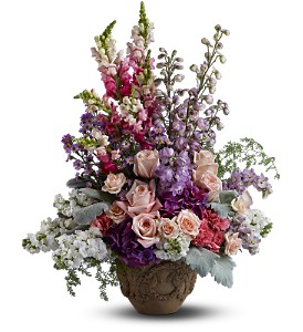 Teleflora's In the Garden Bouquet Fresh Arrangement in a Keepsake Urn
