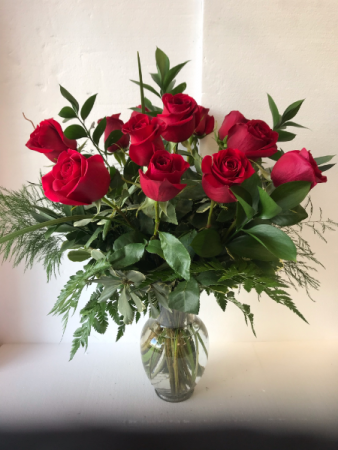 The Modern Dozen Twelve Long Stem Roses mixed as assortment of Fresh Greens