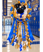 The Royal Pug Pride Homecoming Mum Call Us for Faster Service & Daily Specials: (915) 303-8500 Text Us to Order Anytime: (915) 505-3708 Your trusted source for Flowers & Delivery in El Paso TX 