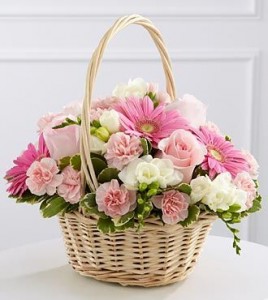 TOUCHING TRIBUTE...small basket of pink and  (S) white flowers to take home after services. 
