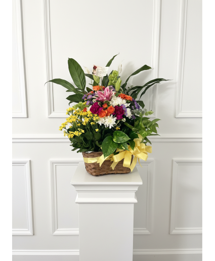 Triple basket arrangement with fresh flowers 