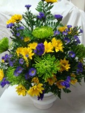 EXPRESSIONS OF SYMPATHY    (S) Flowers in shades of greens, blues, and yellows arranged