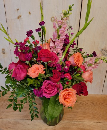 Vibrant Roses Arrangement in a vase in Ithaca, NY | BUSINESS IS BLOOMING