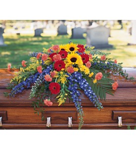 Vibrant Sympathy Casket Spray  in Presque Isle, ME | COOK FLORIST, INC.