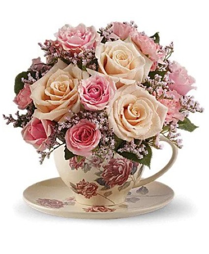 victorian tea cup table arrangement