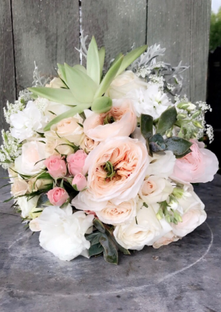 Wedding bouquet Garden roses, succulents and lisianthus
