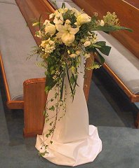 Wedding Ceremony Flowers Cascading Pew Marker  in Fort Lauderdale, FL | ENCHANTMENT FLORIST