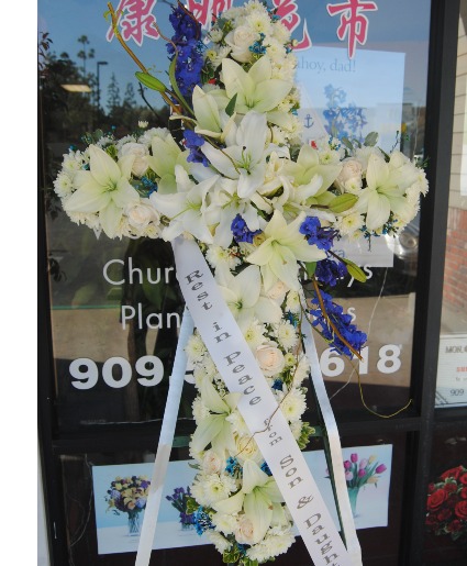 White and Blue Cross  Funaral Spray