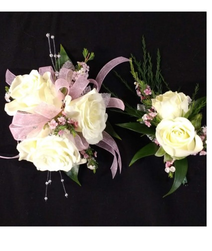 White and pink corsage and boutonnier 