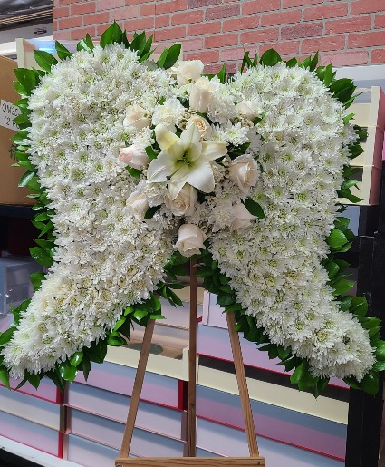 white angel wings  standing wreath funeral