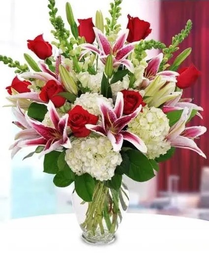 White Hydrangea & Stargazers 