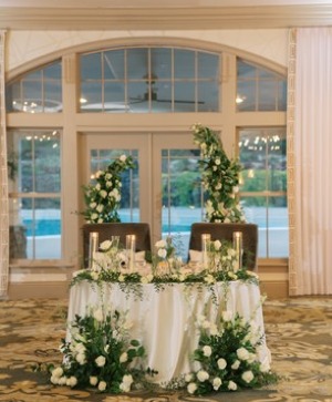 White Rose Arch Sweetheart Table  Reception 