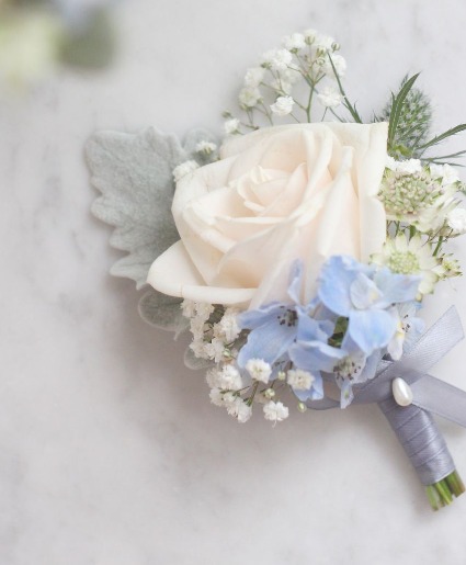 white rose with blue delphinium prom