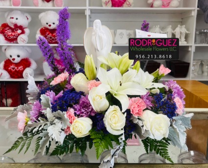 White,lavendar, etc. - Angel Sympathy Arrangement 