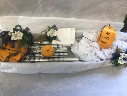 Wind chimes displayed in box 