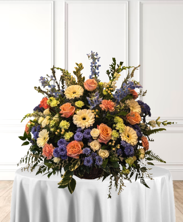 Winter's Sunrise Basket Arrangement in Fitchburg, MA | CAULEY'S FLORIST & GARDEN CENTER