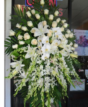 with Orchid standing spray  Funeral Spray